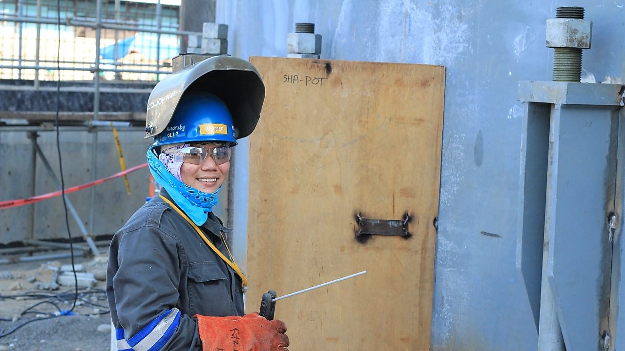 Engineer welding at the site