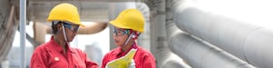two workers discussing a project in a refinery in Malaysia, Bintulu ATl, rercuitment, Malaysia 2013