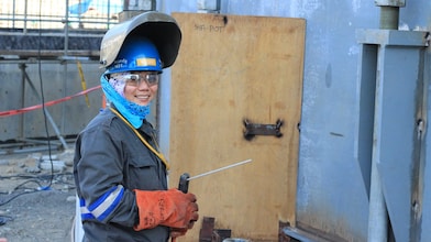 Engineer welding at the site