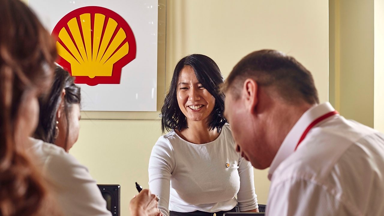 Shell employees meeting in the Shell office