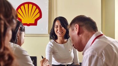 Shell employees meeting in the Shell office