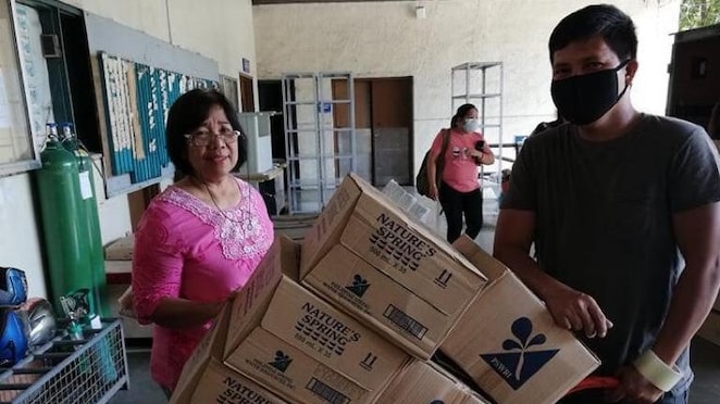 Donation of Select water bottles in a Manila hospital