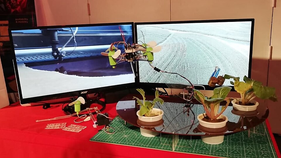 Team Agribon’s agricultural drone on display. The drone is built with AI vision technology developed by the team, that can precisely target only the areas that need to be sprayed with water or chemicals.