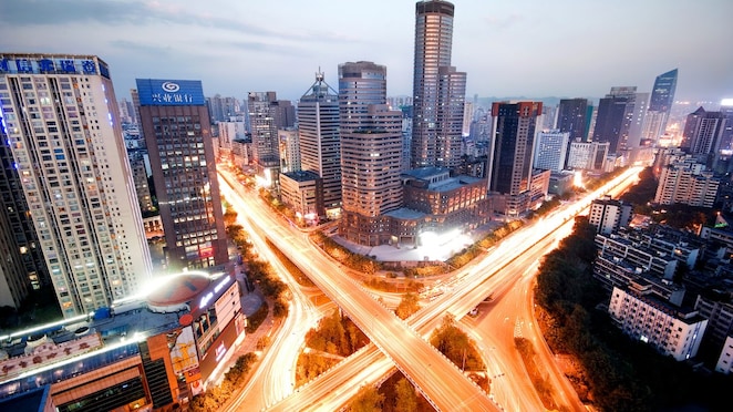 Downtown high rise towers lit up at twilight