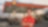 man standing in front of Shell station with folded hands and smiling