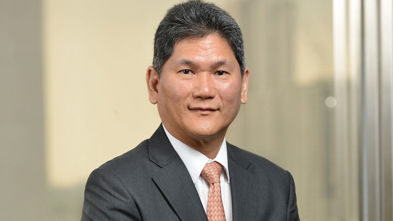 Portrait picture of chairman Asada Harinsuit