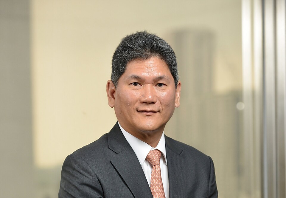 Portrait picture of chairman Asada Harinsuit