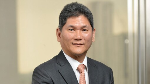 Portrait picture of chairman Asada Harinsuit
