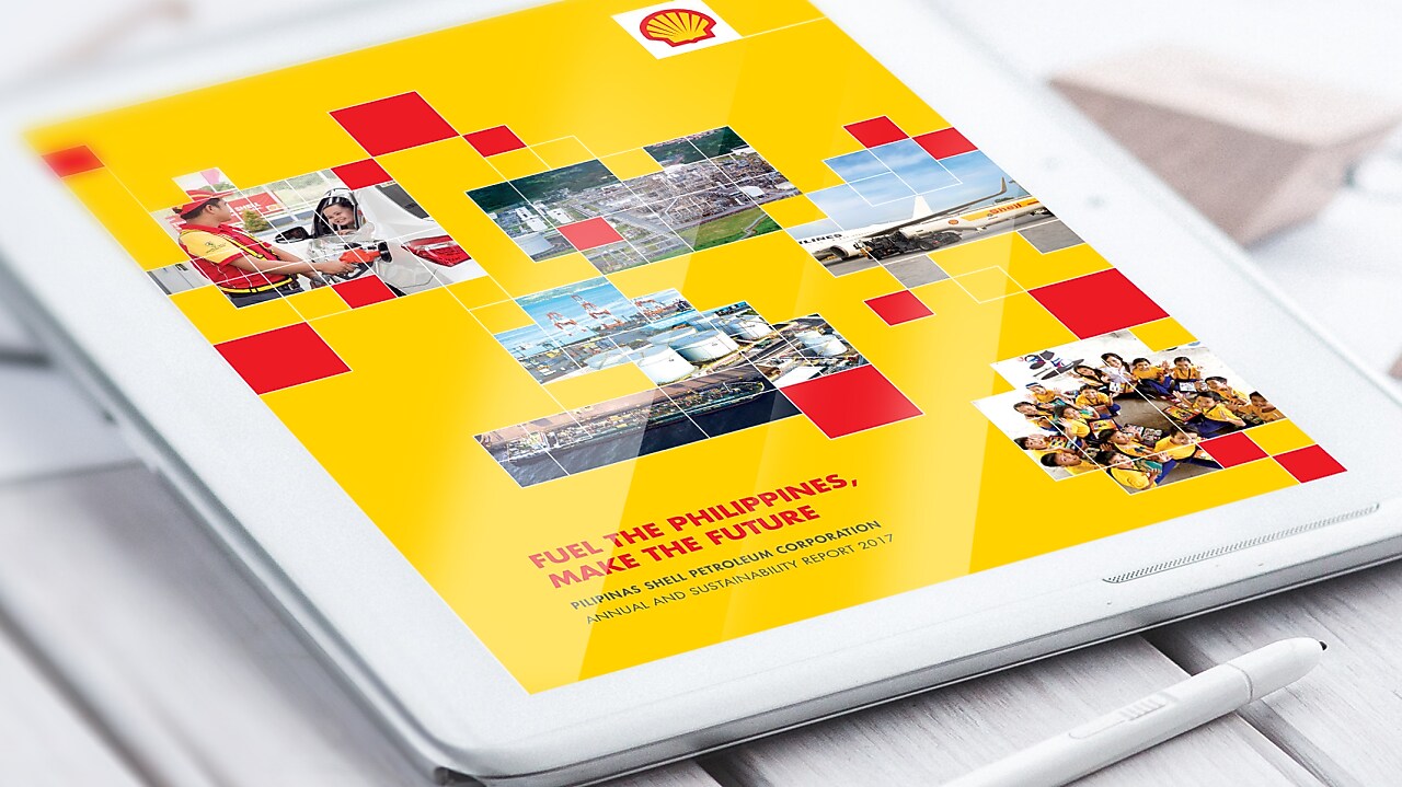 Tablet with Coffee mug next to it