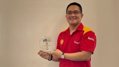 Shell people sat around table